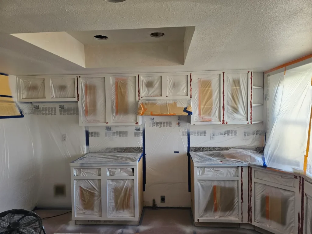 Cabinet Painting in Meridian, ID - Men in White Painting - Before